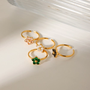 Set of four adjustable gold-plated stainless steel flower rings with colorful zircon gems