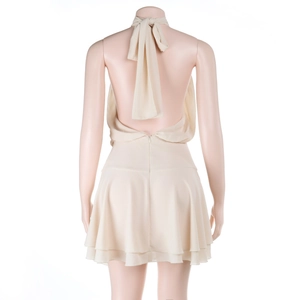 Detail of the champagne chiffon dress showing halter neck backless tie-up design