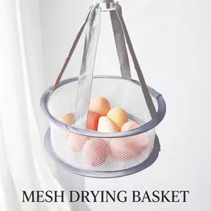 Hanging mesh drying net for beauty blenders with purple trim and white breathable fabric