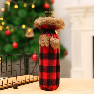 Christmas red and black plaid wine bottle cover with brown faux fur collar and pom-poms