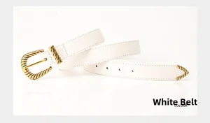 Close-up of a white leather belt featuring a vintage gold twisted metal buckle and tip