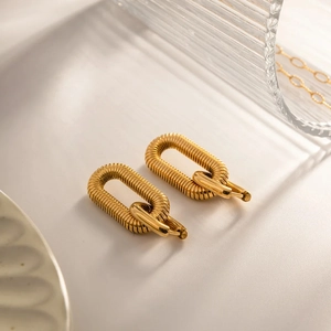 Elegant gold oval chain link earrings with spiral texture crafted in tarnish-free titanium steel
