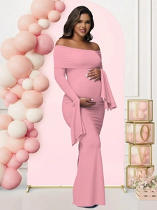 Pink off-shoulder maternity evening gown with flare sleeves and side slit for photography