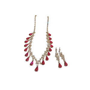 Luxury gold necklace and earring set with red teardrop stones and sparkling crystals