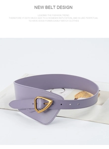 Detail of purple wide leather belt with asymmetric cut and golden triangle buckle