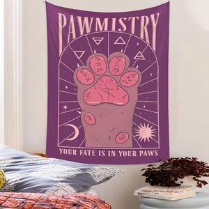Detail of purple Pawmistry tapestry showing cat paw astrology design in a bedroom