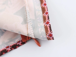 Detailed close-up showing high-quality invisible zipper and neat stitching on printed fabric