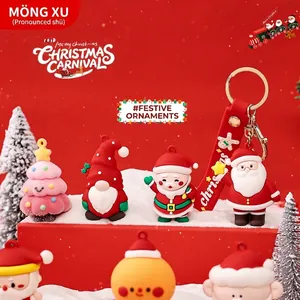 Cute cartoon snowman and Santa keychain set with festive silicone charms and straps