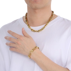 Detail of 10mm gold vacuum plated hip hop pig nose chain necklace and bracelet for men