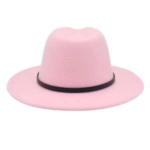 Detail of pink wool fedora hat featuring a black leather band and flat brim design