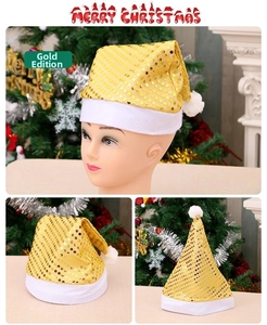 Close-up of gold sequined Christmas hat with white plush trim and fuzzy pom-pom detail