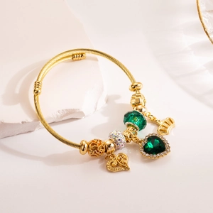 Adjustable gold rope bracelet with green heart gemstone and crown charms for women