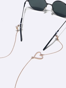 Golden metal glasses chain with heart-shaped pearl pendant and anti-slip rubber loops