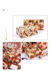 Detail view of retro sports themed gift wrapping paper with soccer and basketball patterns