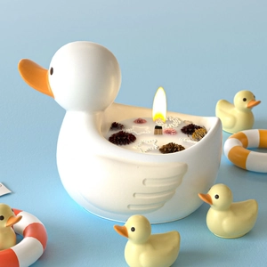 Cute duck scented candle in white resin holder with dried flower and star decorations