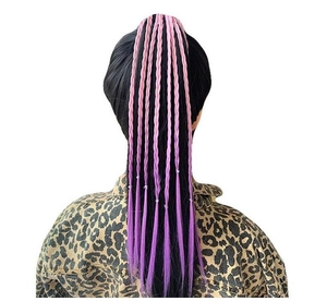 Detail showing pink to purple gradient braided hair extensions for girls' ponytails