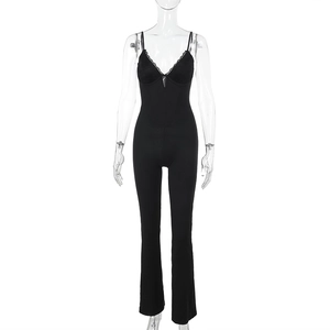 Detail of black lace trim bodice and slim fit design on sexy flared jumpsuit