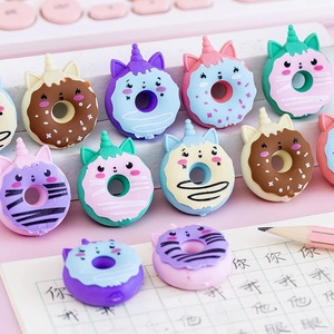 Cute colorful unicorn donut erasers set on a notebook for school student stationery gifts