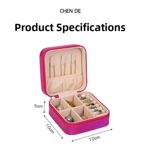 Detail of pink PU leather jewelry box showing internal compartments and 10x10x5cm dimensions
