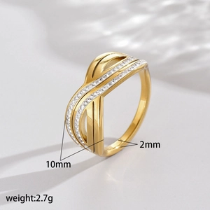 Detail of gold multi-layer crossover ring with embedded crystals and 10mm width measurement