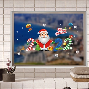 Detailed Santa Claus and Merry Christmas 2022 window sticker on glass surface