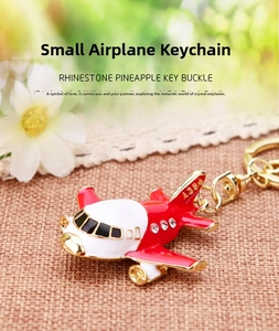 Detailed macro of airplane keychain with sparkling rhinestones and A380 tail fin detail