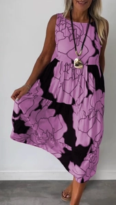 Detail of purple and black floral print on a sleeveless summer midi dress for women