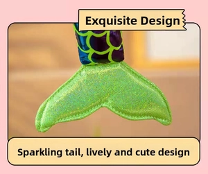 Close-up of a glittering green mermaid tail plush toy with shiny sequin details