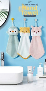 Detailed view of hanging coral fleece towels in cute penguin dog and cat animal shapes