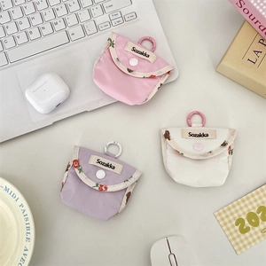 Small floral print fabric pouch for wireless Bluetooth earphones in three pastel colors