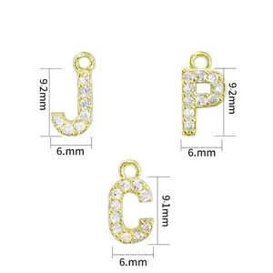 Mini gold plated letter pendants with cubic zirconia stones and precise 9mm dimensions