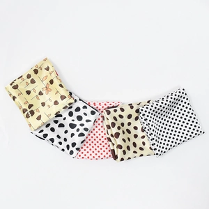 Polka dot and floral silk feel square scarves set on a clean white background