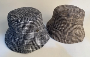 Detailed view of vintage plaid wool bucket hats for women in two different check colors