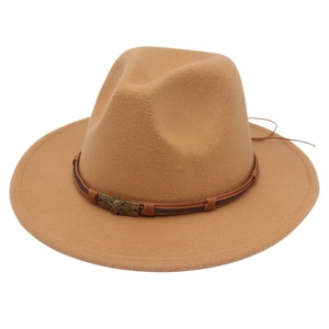 Close-up of camel wool jazz hat featuring a leather band and vintage skull metal buckle