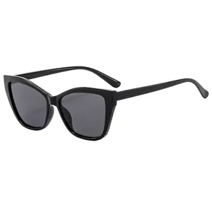 Classic black cat-eye sunglasses for women with dark grey lenses and a 45-degree side view