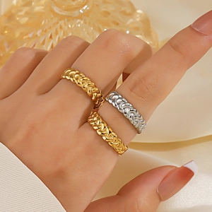 Twisted stainless steel stackable ring for women in gold and silver finish on silk