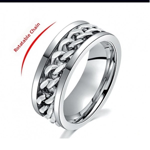 Close-up of rotatable chain mechanism on the polished stainless steel anxiety ring