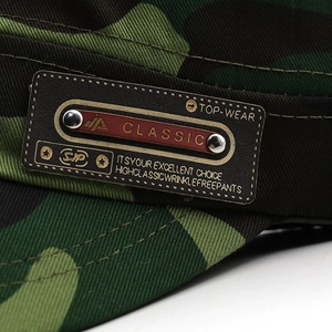 Flat top camouflage military cap with classic faux leather patch and metal rivet detail