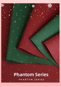 Detail of red and green Christmas wrapping paper with phantom silver rhinestone patterns