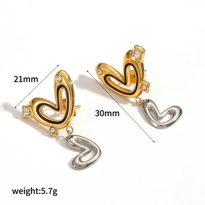 Detail shot showing heart earring dimensions: 30mm length and 21mm width with 5.7g weight