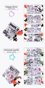 Détail d'un livre en tissu pour bébé avec queues d'animaux 3D et crochets de suspension