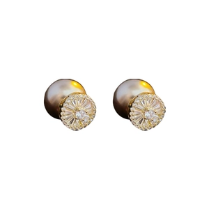Elegant gold-plated pearl stud earrings with sparkling crystals on a clean white background