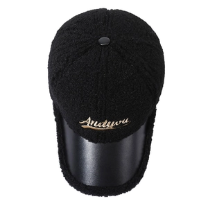 Black sherpa fleece baseball cap with leather brim and golden embroidery