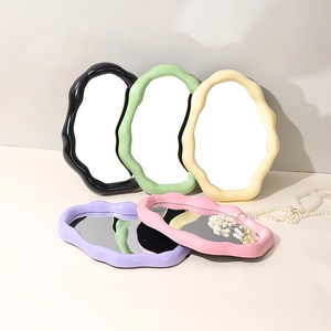 Cloud-shaped aesthetic makeup mirror with wavy frame in five diverse pastel colors