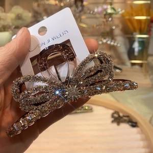 Elegant gold bow hair claw clip with rhinestones for women, large fashion shark clip