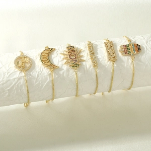 Adjustable golden MAMA bracelet set with colorful zircons and Hamsa hand pendant charms