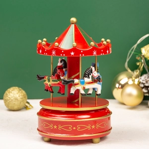 Classic red and green carousel music box with golden horses for Christmas table decor