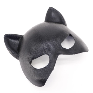 Detail shot of the black leather cat ear masquerade mask with a sleek textured finish