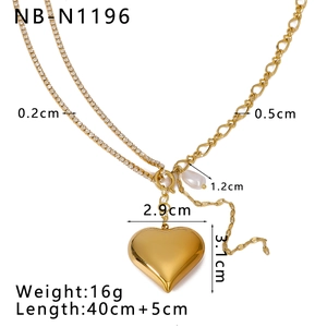 Detailed view of 18k gold heart pendant necklace with pearl charm and size specifications