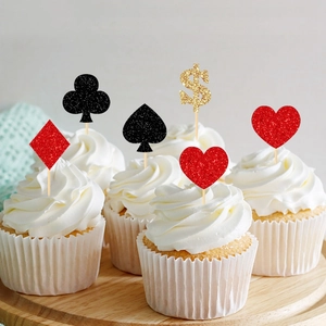 Glittering poker suits and gold dollar sign cake toppers for magic themed parties
